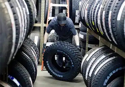 a man working on a tire