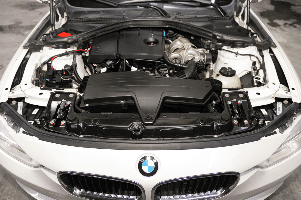 bmw services in Durango, CO, auto repair in Durango, CO at Firestone of Durango. Image showcasing the engine bay of a white BMW