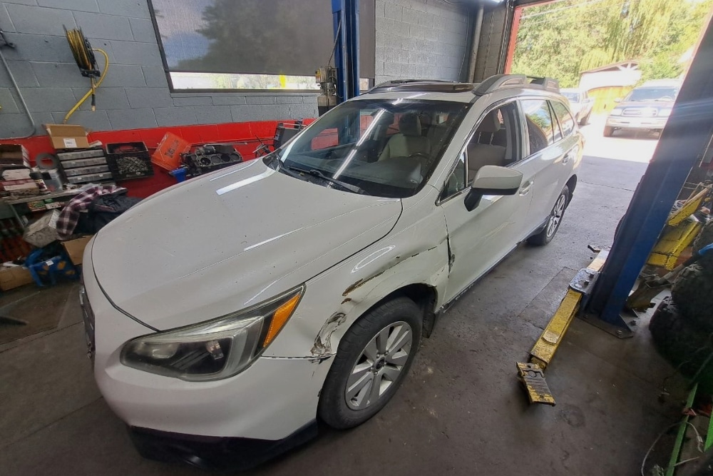 Preventative Maintenance in Durango CO At Firestone of Durango. Car in professional auto repair shop undergoing preventive maintenance