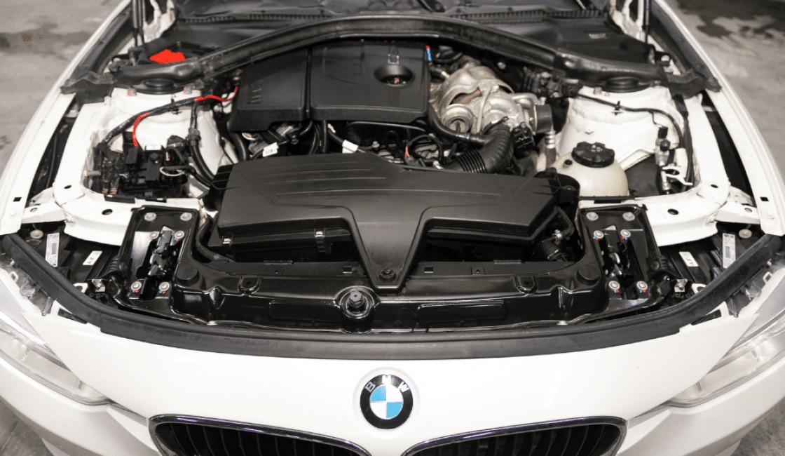 bmw services in Durango, CO, auto repair in Durango, CO at Firestone of Durango. Image showcasing the engine bay of a white BMW